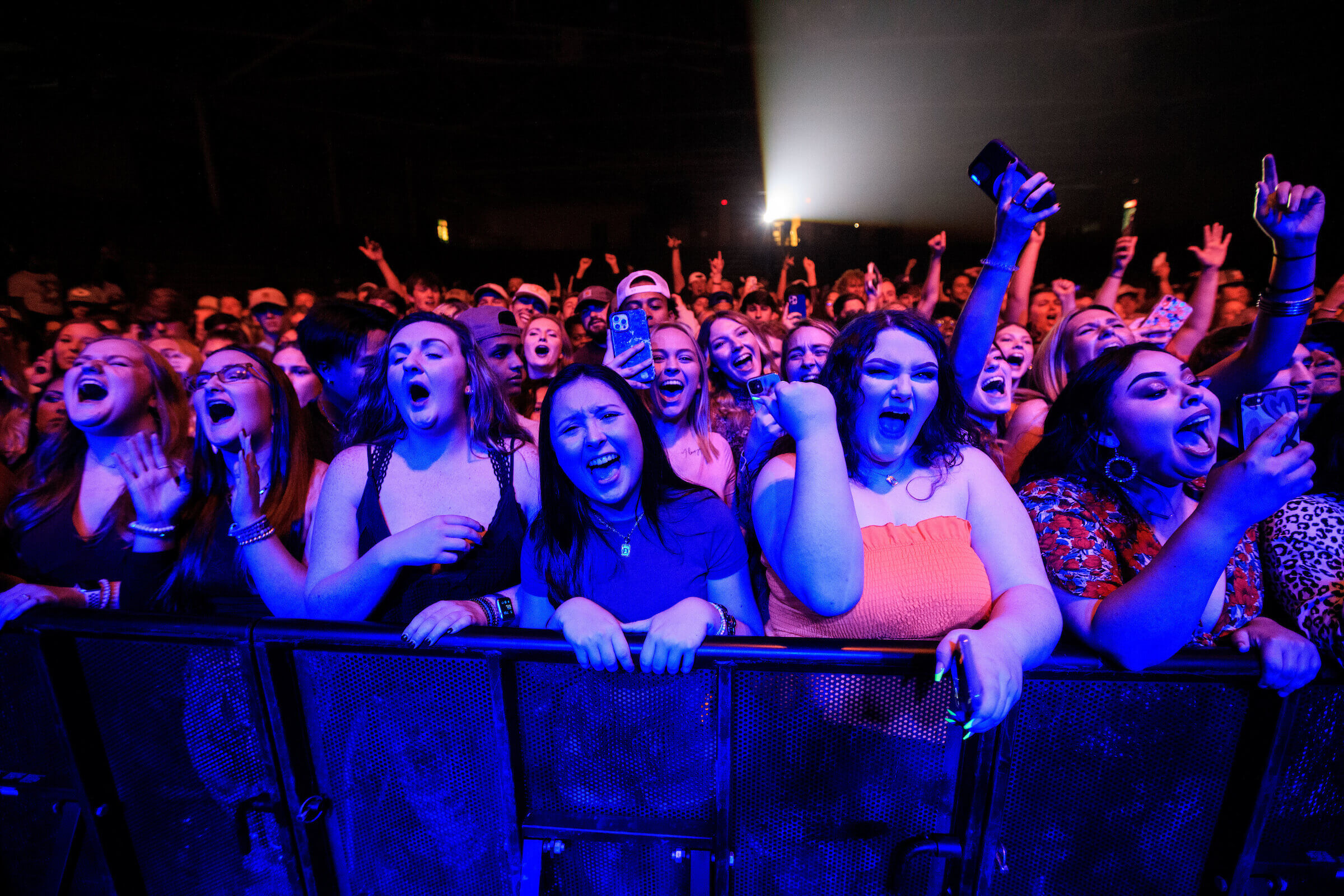 Crowd of students cheering at a convert.